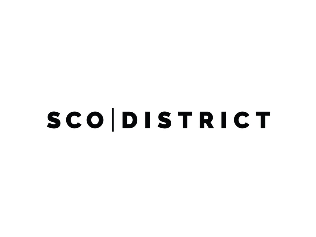 The image displays the text "SCO | DISTRICT" in black capital letters on a white background.