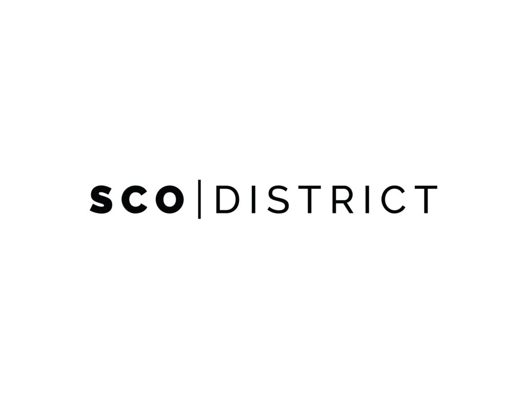 A logo with the text "SCO | DISTRICT" against a white background.